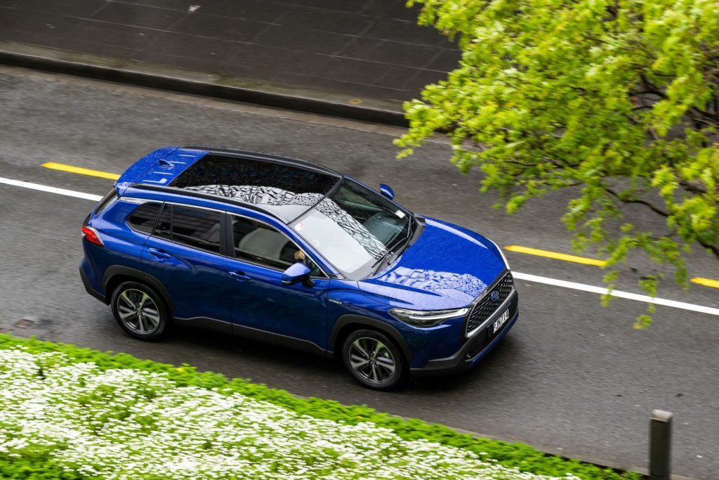 2022 Toyota Corolla Cross Limited driving in the city