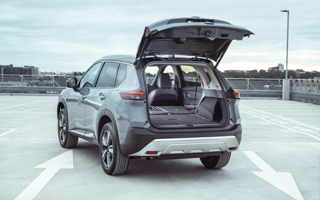 Nissan X-Trail rear three quarter view with boot open