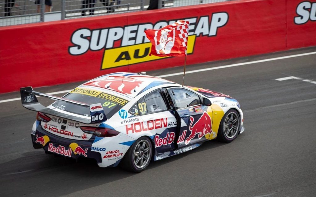 Holden ZB Commodore rear three quarter view driving at Bathurst