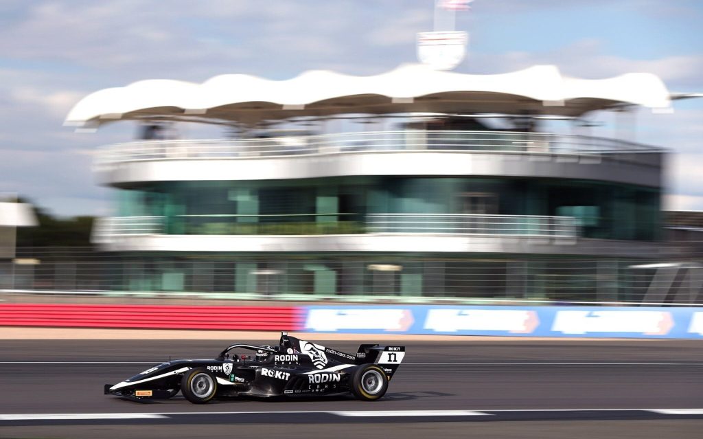 British Formula 4 car racing around track