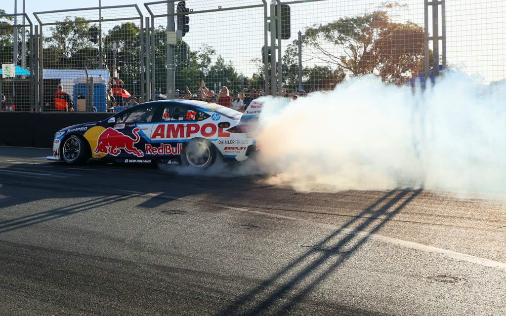 Shane van Gisbergen's Holden ZB Commodore Supercar doing a burnout