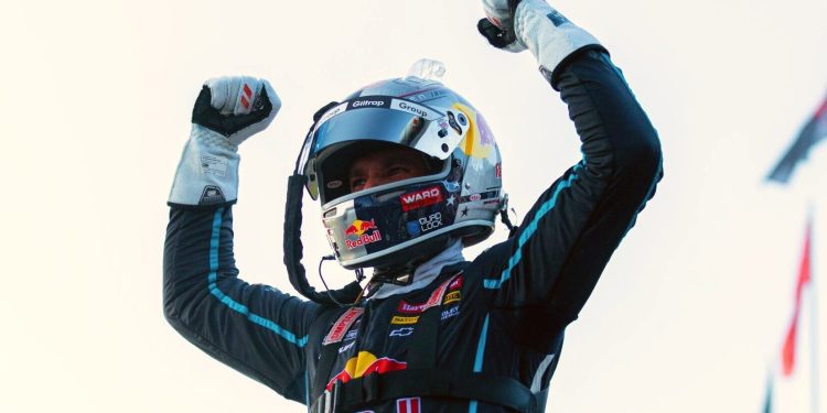 Shane van Gisbergen celebrating with arms in air