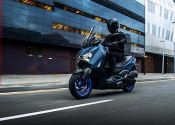 Yamaha Xmax riding through city