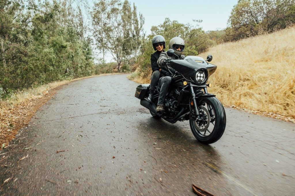 Honda Rebel 1100 riding on wet road