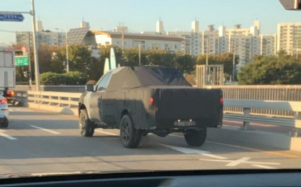 Kia ute rear three quarter view