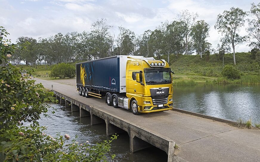 MAN TG truck and trailer front three quarter view