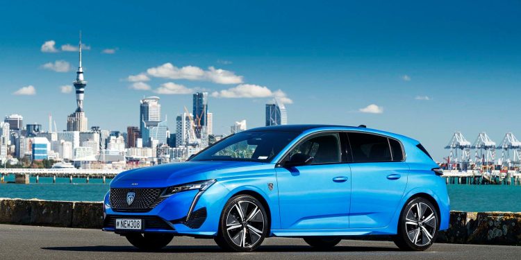 Peugeot 308 in front of Auckland skyline