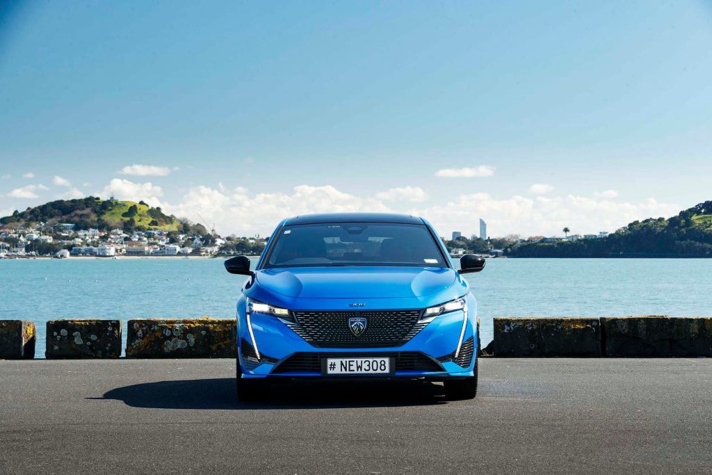 Peugeot 308 GT in front of water