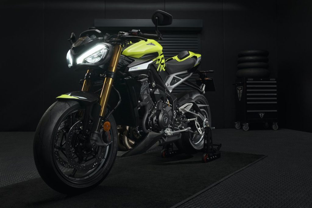 Triumph Street Triple in dark workshop