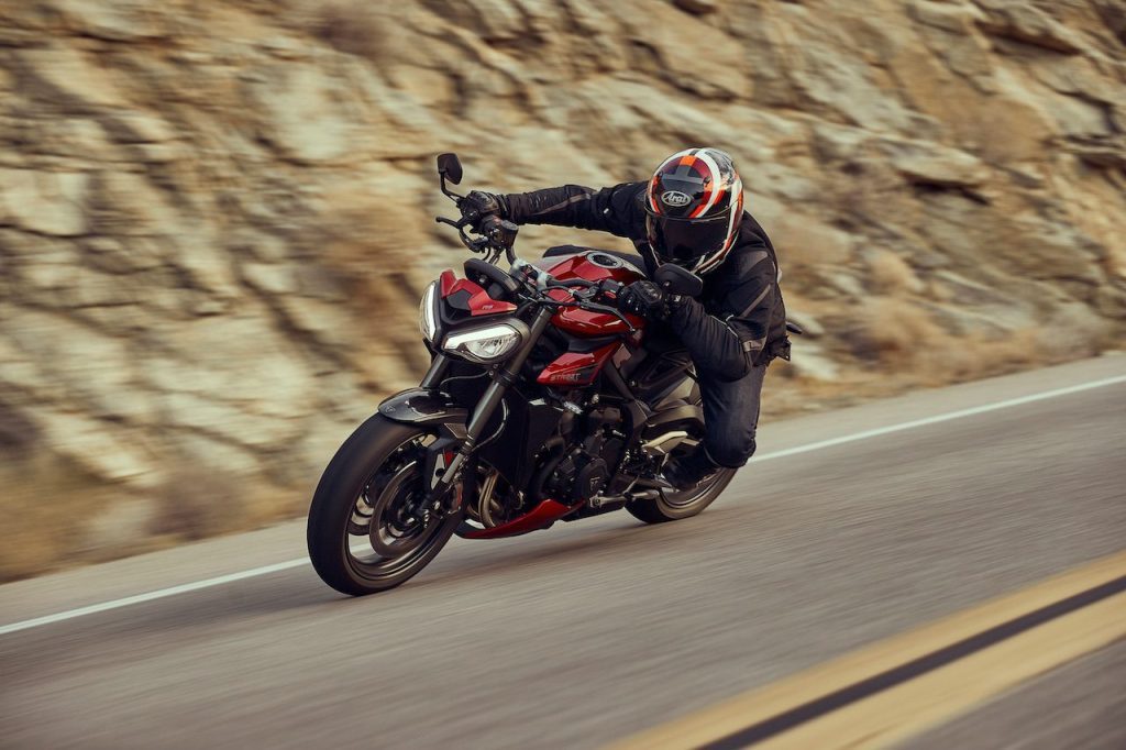 Triumph Street Triple riding through canyon