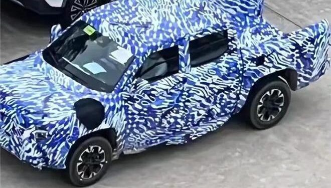 BYD ute front three quarter view in camouflage