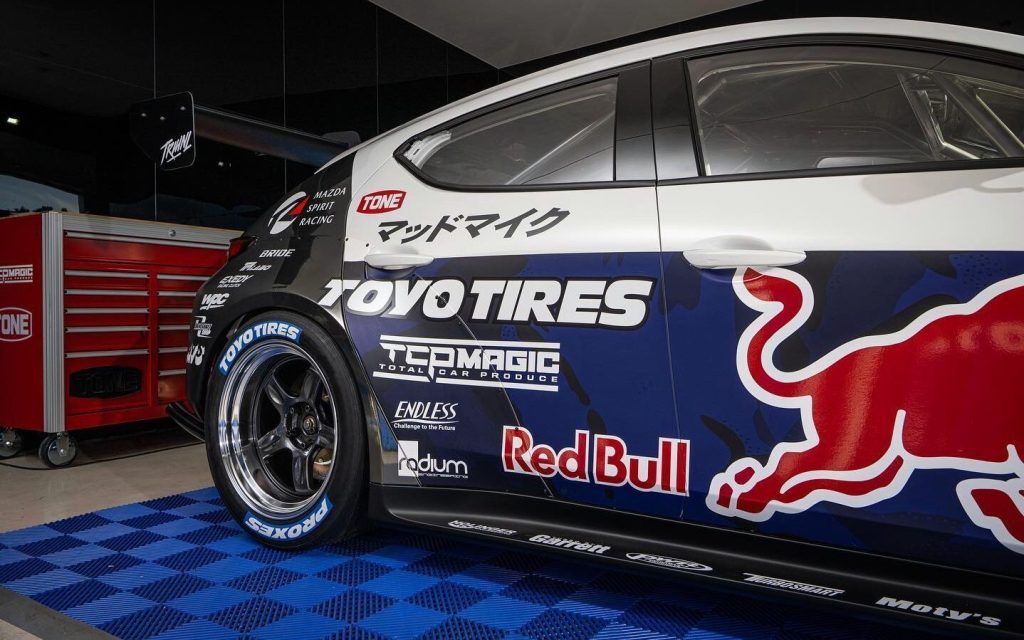 Mad Mike Whiddett's Mazda3 hillclimb car rear quarter
