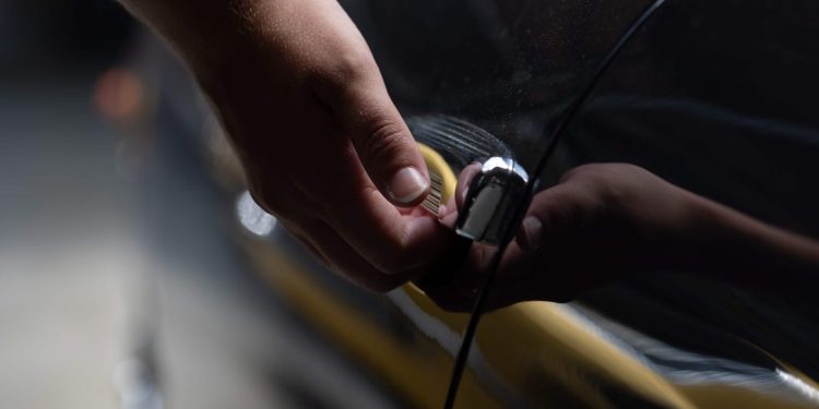 Person opening car door