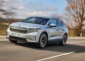 Skoda Enyaq front three quarter view driving on road