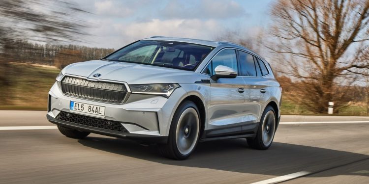 Skoda Enyaq front three quarter view driving on road