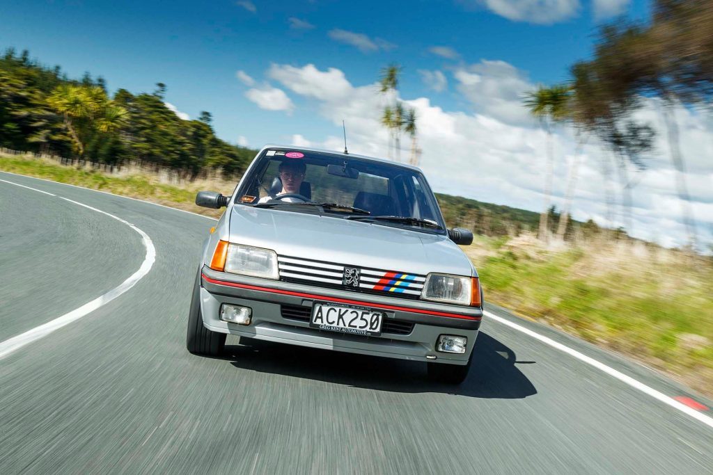 Peugeot 205 GTi driving through corner