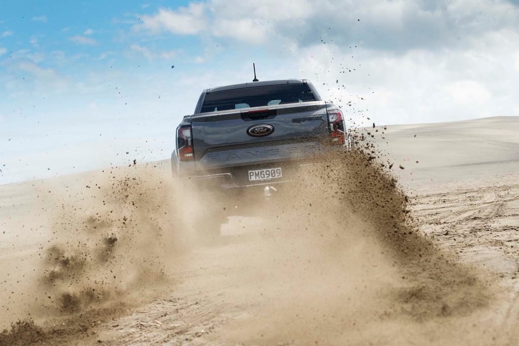 Ford Ranger Raptor kicking up sand