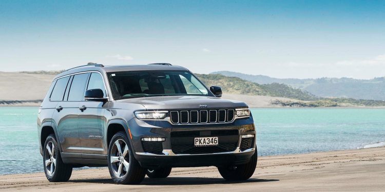 Jeep Grand Cherokee L Limited on beach on sunny day