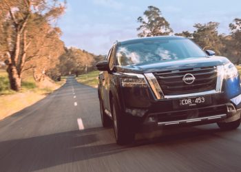 Nissan Pathfinder driving along road