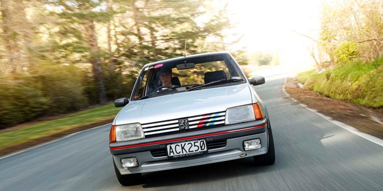 Peugeot 205 GTi driving through trees