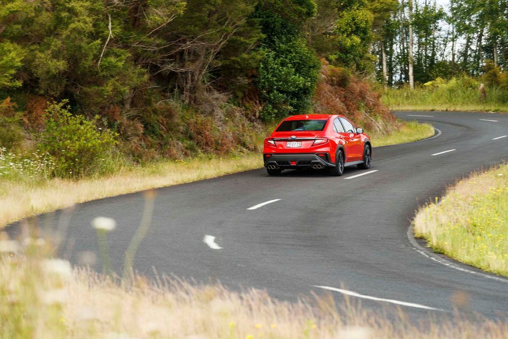 Subaru WRX 2.4T Premium rear on twisty road