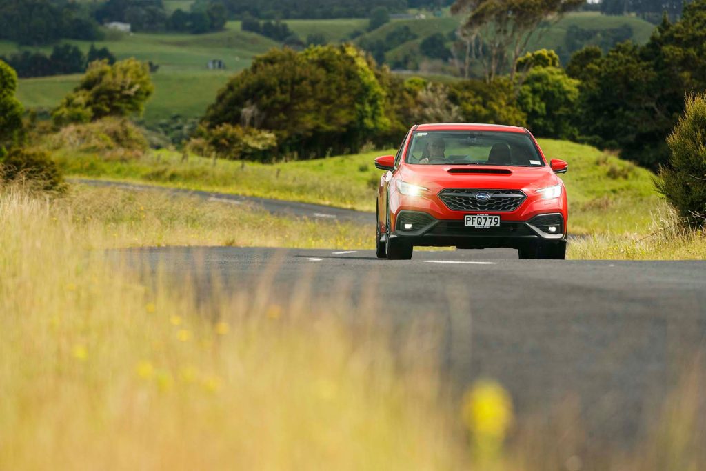 Subaru WRX 2.4T Premium wide front action on twisty road