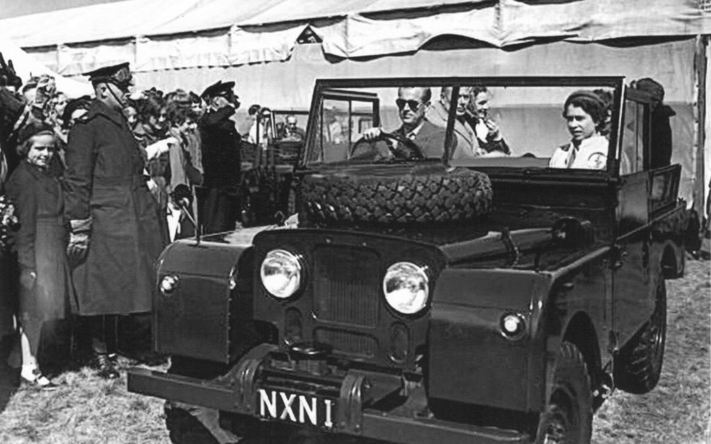 Queen Elizabeth 2 riding in Royal Land Rover Series 1