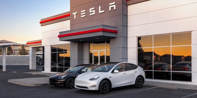 Tesla Model 3s outside dealership