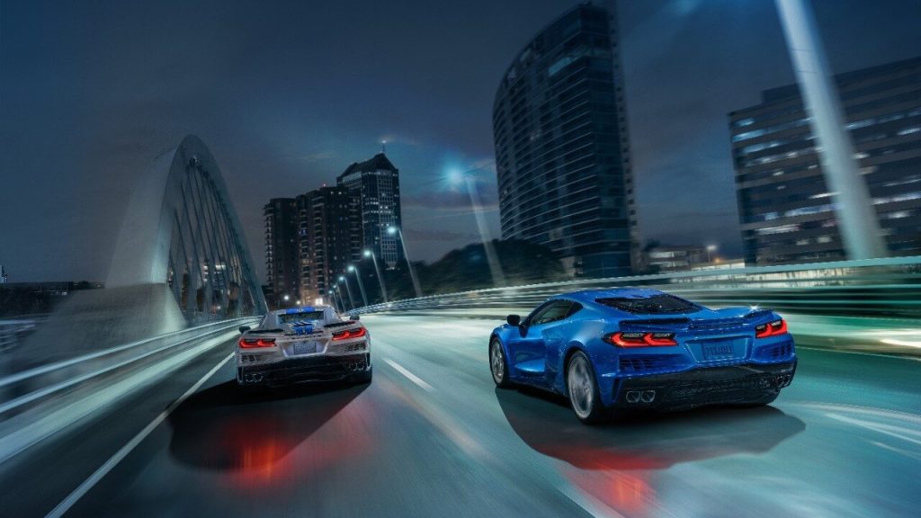 Two Chevrolet Corvette E-Ray driving over bridge rear view