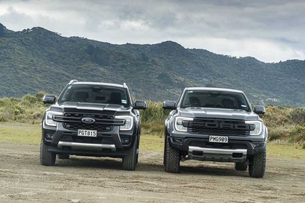 Ford Ranger Raptor vs Ford Ranger Wildtrak parked on sand