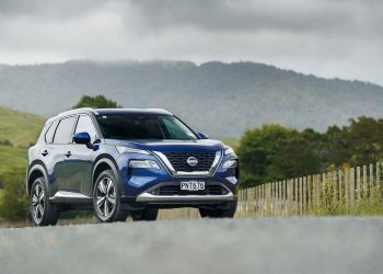 Nissan X-Trail Ti-L with mountains in background