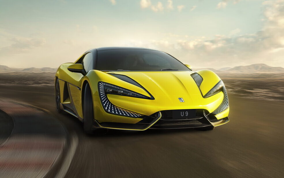 YangWang U9 supercar driving on road front three quarter view