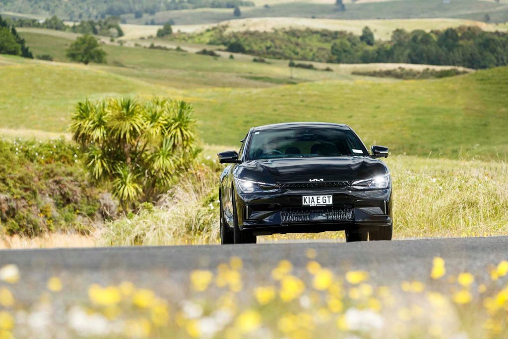 Kia EV6 GT driving in countryside