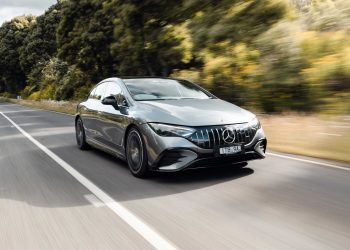 Mercedes-Benz EQE 53 driving on road front view