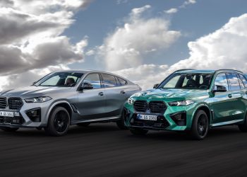 BMW X5 and X6 M Competition driving on road