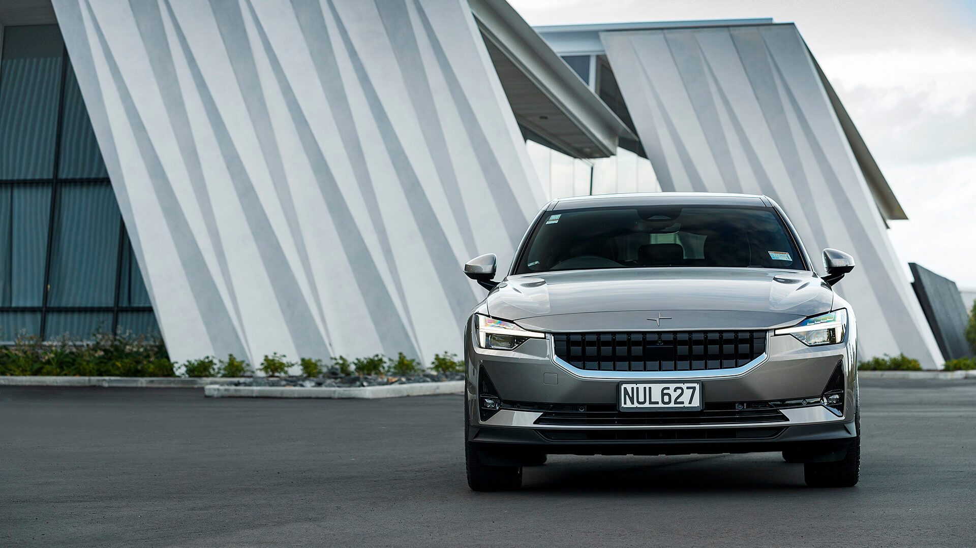 Polestar 2 front view infront of building