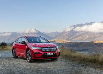 Skoda Enyaq with mountains in background