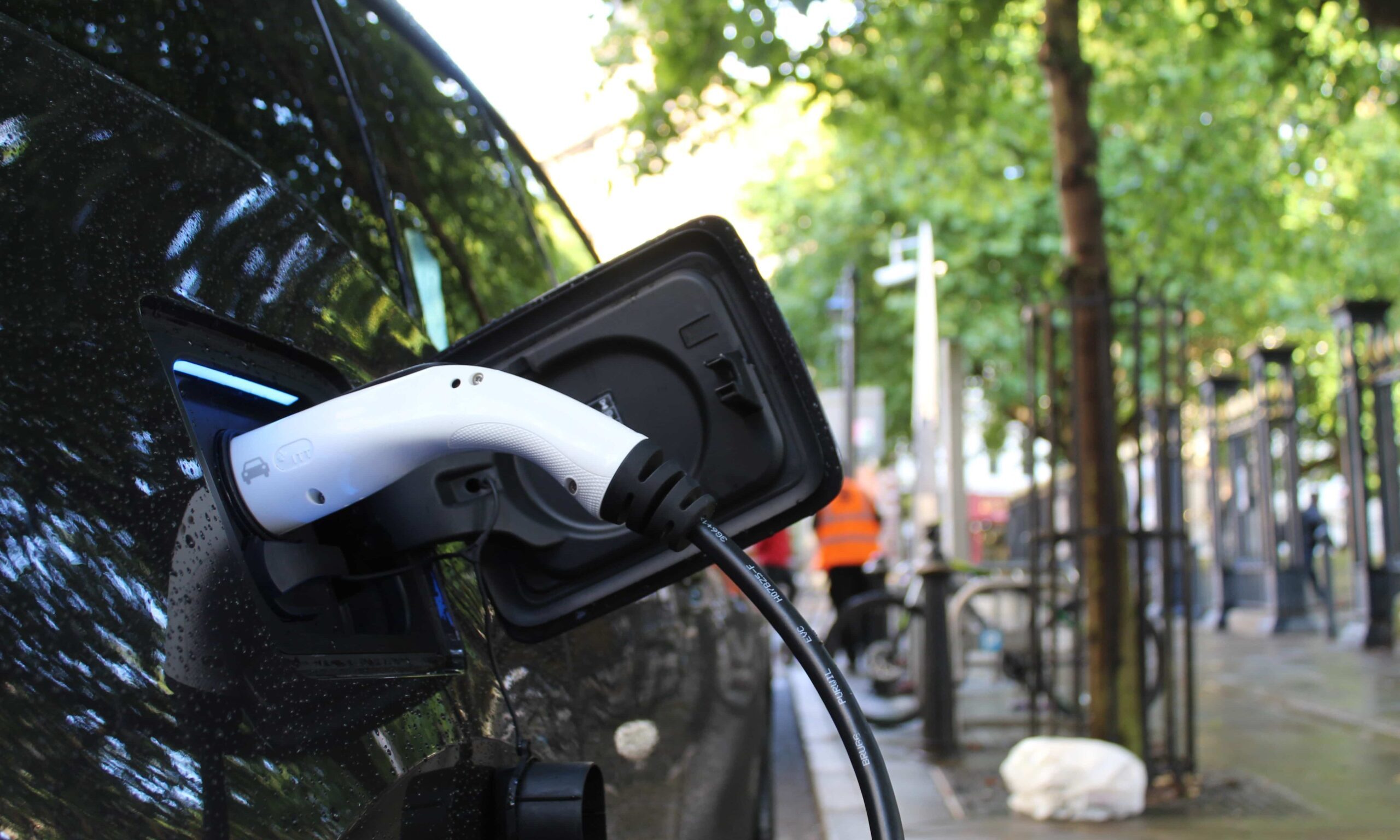 Electric car charger plugged in