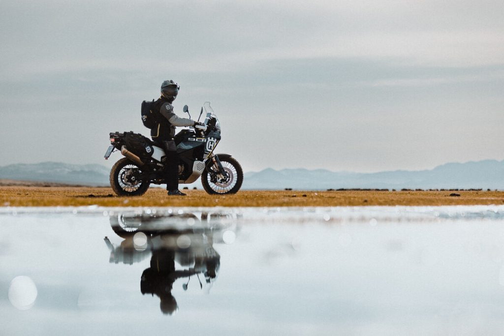 Husqvarna Norden 901 next to lake