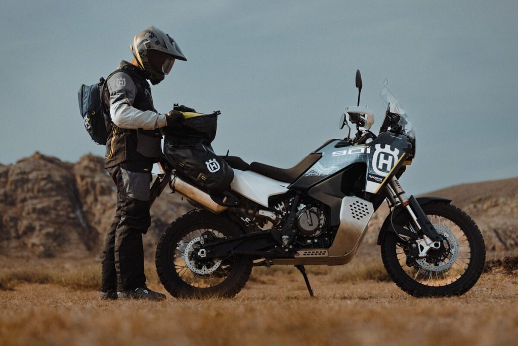 Husqvarna Norden 901 with rider loading panniers