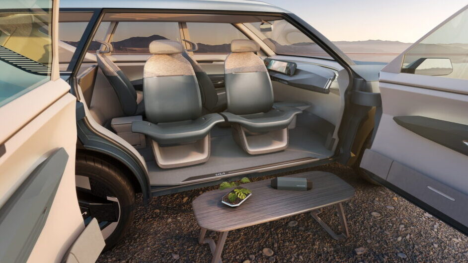 Kia Concept EV5 side doors open with swivel seats turned