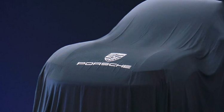 Covered fully electric Porsche SUV