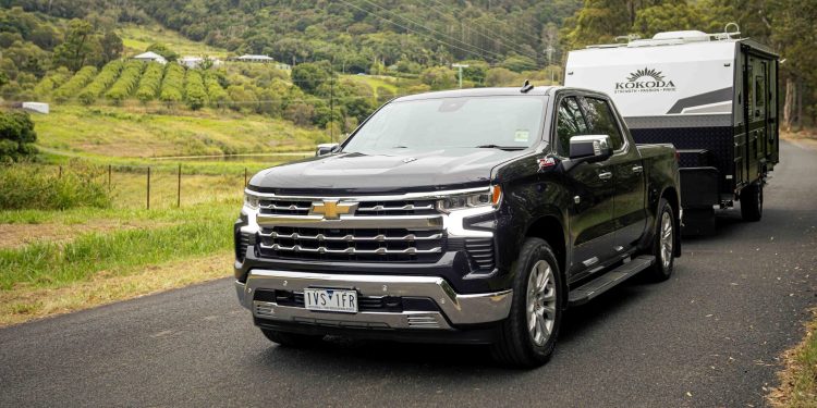 2023 Chevrolet Silverado LTZ Premium towing caravan on country road