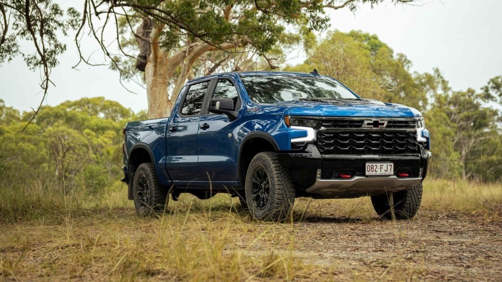 2023 Chevrolet Silverado ZR2 front three quarter view by trees