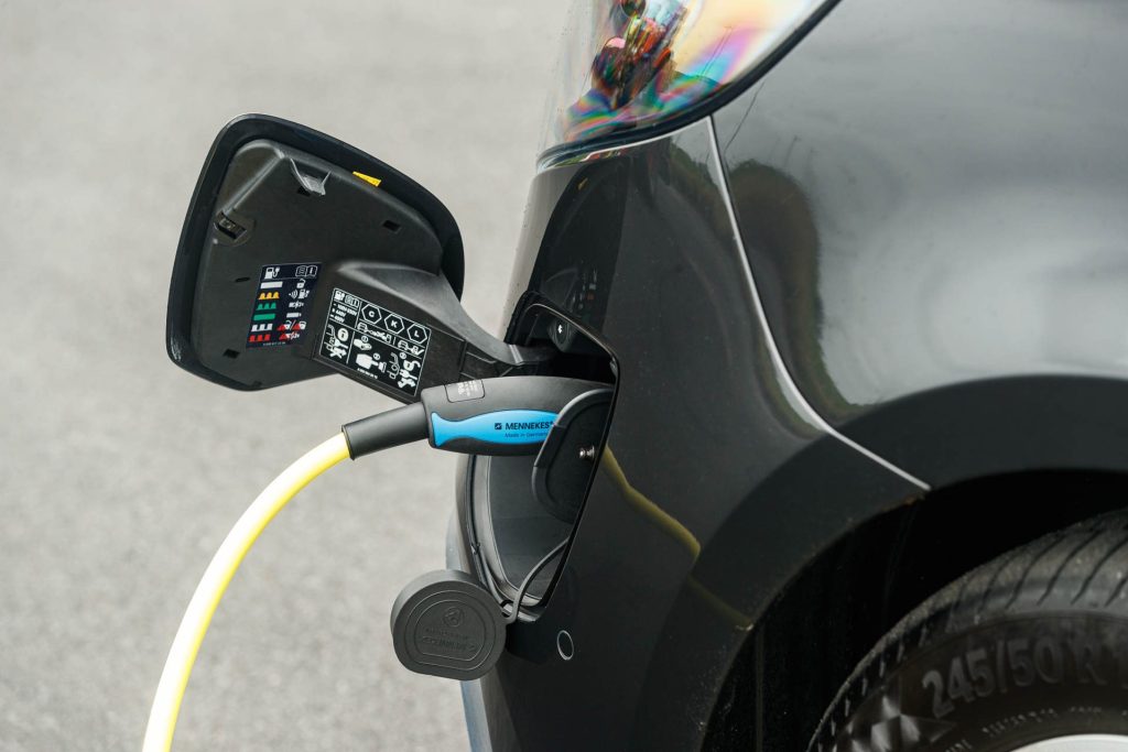 Charging port plugged in, on Mercedes-Benz EQV