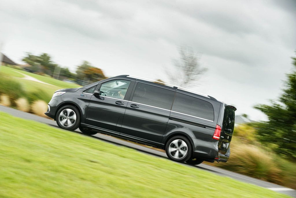 Side shot of the Mercedes-Benz EQV driving past