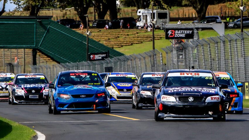 Holden and Ford V8 Utes racing at Pukekohe