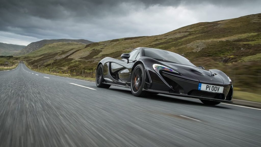 McLaren P1 front three quarter view driving on road