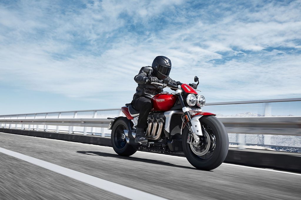 Triumph Rocket 3 front action rolling shot, on a motorway bridge