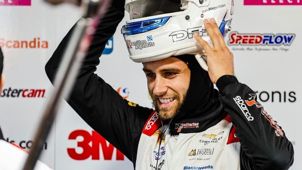 Andre Heimgartner putting helmet on